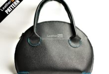 Photo of Яркая кожаная сумка-клатч